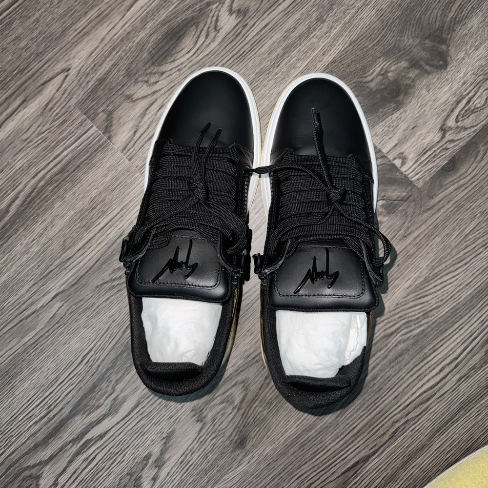 Black men’s Guisseppe Zanotti shoes. Worn once inside a home.